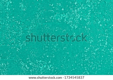 Blue green painted wall texture background.