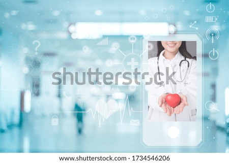 Woman doctor is Diagnosticing online on smartphone with medical analysis icons, medical technology concept 