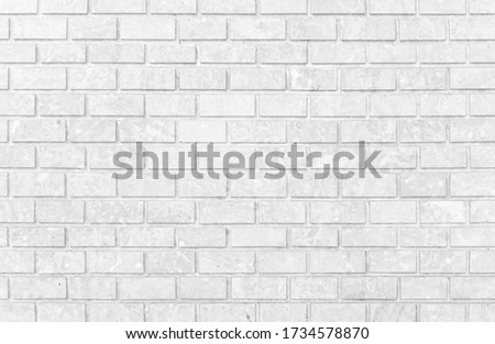 A wall of white stone blocks for a background or design. Close-up texture.