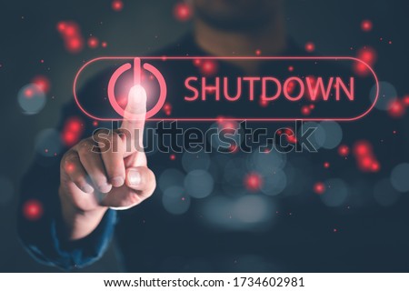 human hand press shutdown button on virtual screen. Shut down concept, Free space for text or design. Royalty-Free Stock Photo #1734602981