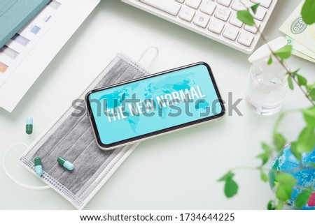 The new normal background concept. New normal after Covid19 coronavirus for  lifestyle change after virus crisis. The business and economic activities change after virus outbreak concept background. Royalty-Free Stock Photo #1734644225