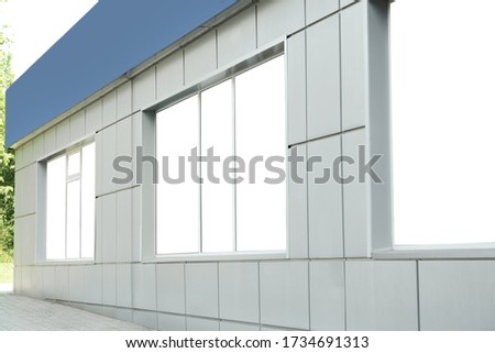 Blank banners on window outdoors. Advertising board design