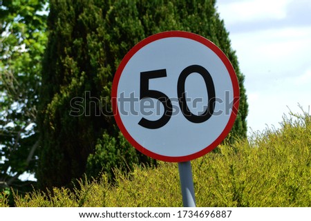 A Train Railway sign 50 miles speed limit