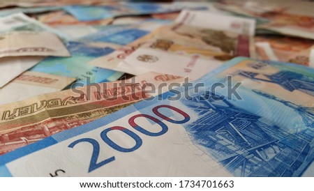 A lot of money, different countries, different equivalents.Business photos.