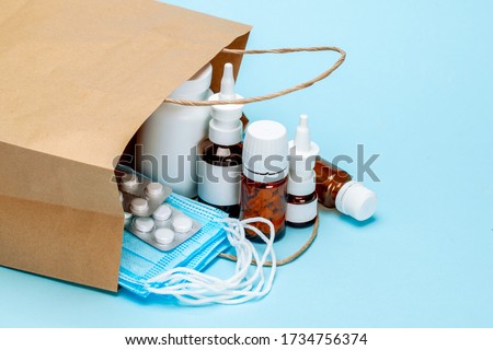 Order medicines online and delivery. Pack of medicines, pills and masks. Royalty-Free Stock Photo #1734756374