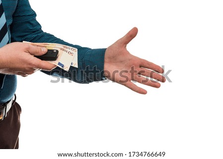 businessman holding euro banknotes and car keys isolated on white background closeup. Buy or rent car concept