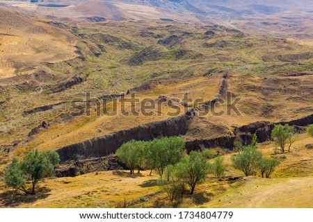 Estimated location of Noah's Ark in Eastern Turkey, Agri Province. Noah's Ark National Park. Searches for the bible relic. Outlines of the Ark in the ground Royalty-Free Stock Photo #1734804779
