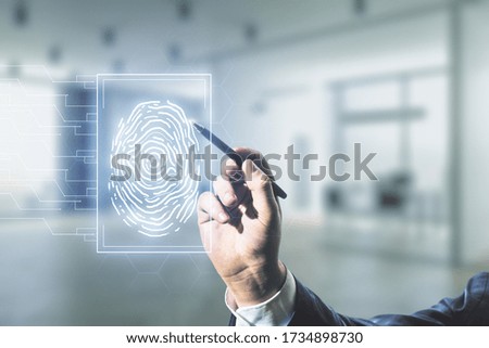 Multi exposure of programmer's hand with pen working with virtual abstract fingerprint illustration on blurred office background, digital access concept
