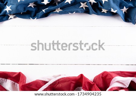 Happy Memorial Day, May 25. American flags against white wooden background. Flat lay with copy space.