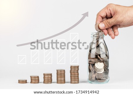 Saving to improve financial and use some to invest to grow up your profit and give you passive income. Gradually invest to avoid money inflation in long period is good plan for future finance Royalty-Free Stock Photo #1734914942