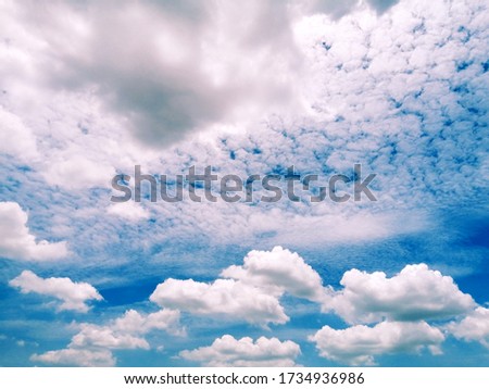 The​ pattern​ of​ dim​ clouds on the​ blue​ sky. White​ clouds​ on​ the​ blue​ sky. Closeup​ beautiful​ clouds on the​ landscape. Beutiful​ skylight. 