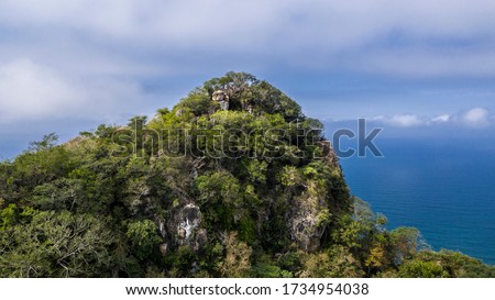 Cerro del Mono is a beautiful mountain covered by trees and popular destination for tourist coming from nearby Puerto Vallarta. Monkey mountain is Located in state Nayarit in Mexico. Royalty-Free Stock Photo #1734954038