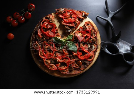 Vegan pizza with soy meat, tomato, pepper and basil Royalty-Free Stock Photo #1735129991