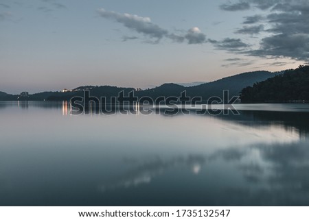 sun moon lake reflection in dawn 