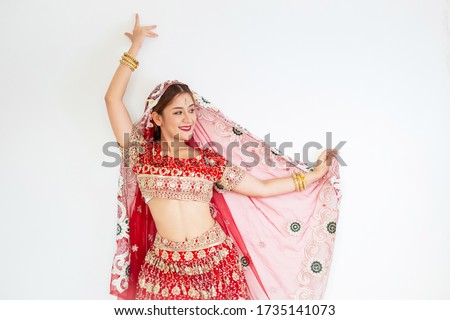 Beautiful indian woman, hindu woman model mehndi and kundan jewelry . Traditional Indian costume Indian or Muslim woman
