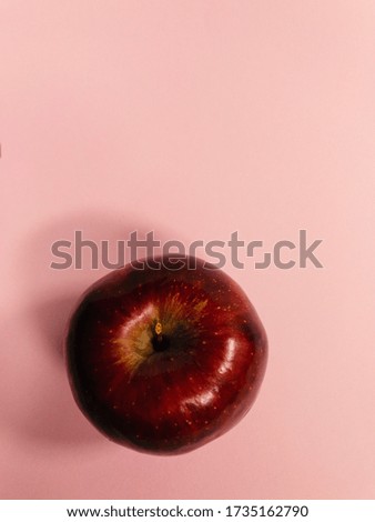 Red apples placed on the background