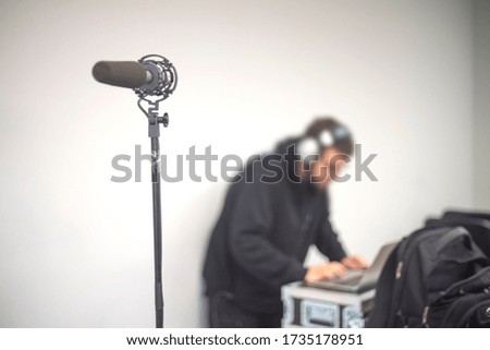 sound engineer at the console at a concert