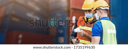 Image banner, Two caucasian foreman checking digital thermometer after checking fever. Prevent the outbreak of the virus covid-19.