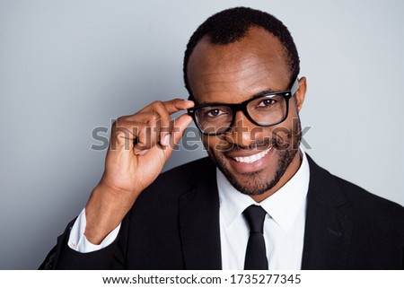 Close-up portrait of nice attractive cheerful cheery bearded guy banker economist employee touching specs health care medical eyecare lenses isolated on grey pastel color background Royalty-Free Stock Photo #1735277345