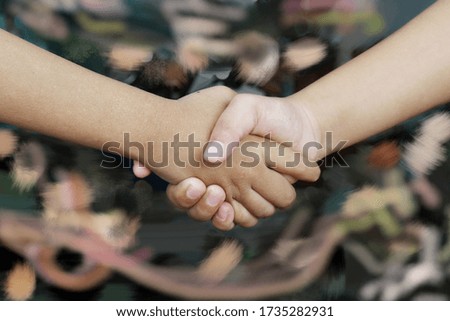 Illustration photo graphic of shake hands to forgive each other in the feast of Muslims Eid al fitr