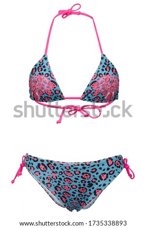 Detailed shot of a blue two-piece swimsuit consists of bikini and a triangle bra with thin straps. The swimsuit with pink leopard pattern and printed elephants on the bra is on the white backdrop.
