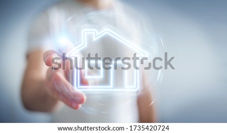 Man on blurred background using real estate digital neon interface 3D rendering