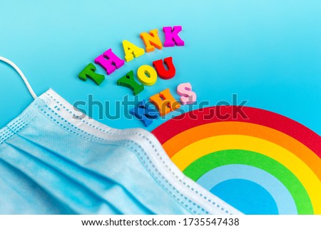 "Thank you nhs" text from the colored letters,rainbow,face medical mask