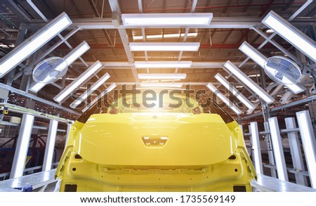 industrial paint booth cars repair station. Spray painting high quality in the industrial cabinet painting booth cars repair station of vehicles production line process in factory 

 Royalty-Free Stock Photo #1735569149