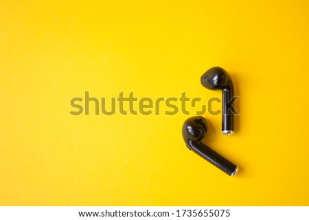 Black wireless headphones. Gadget and technology concept with copy space Royalty-Free Stock Photo #1735655075