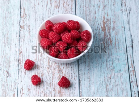Berries, summer fruits on a wooden table. Healthy lifestyle concept. Selective focus