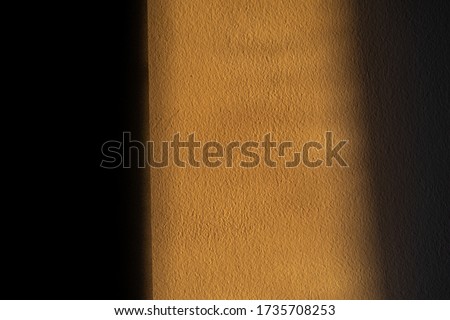 Abstract photos of a room with bright sunlight and a dark side