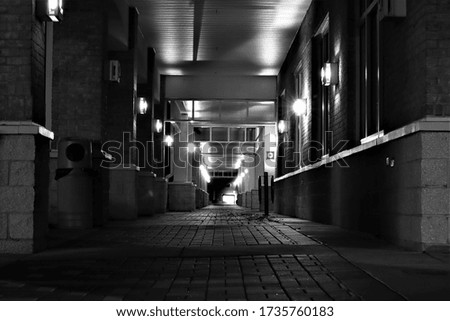 dark alley at night with lights
