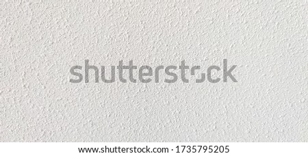 White wall with grunge texture background.