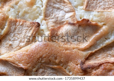 Food background surface of a sweet apple pie close-up macro photography