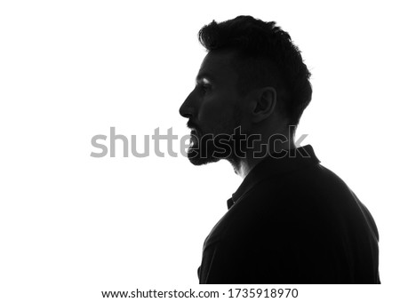 Profile  silhouette of male person over white