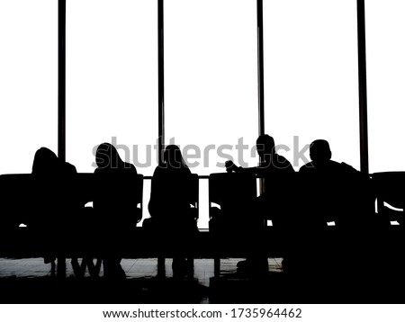 Shadow of people sitting on a chair in airport on white background