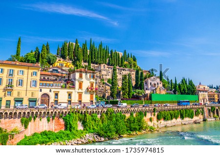 Castel San Pietro St. Peter Castle, Museo Archeologico, Convento di San Girolamo on hill with cypress trees and Adige river in Verona city historical centre, blue sky, Veneto Region, Northern Italy Royalty-Free Stock Photo #1735974815
