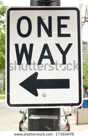 Black & white 'One Way' street sign