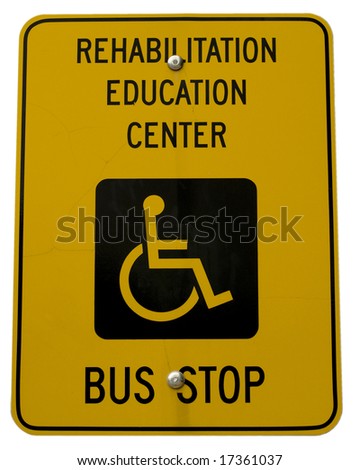Yellow bus stop sign with handicap symbol