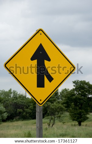 Single yellow and black merge sign