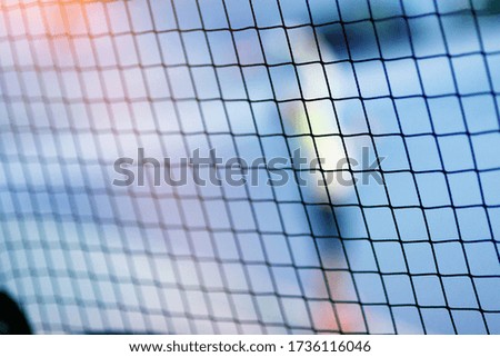 Soft focus close-up photo of indoor Tennis Net