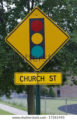 Yellow stoplight street sign