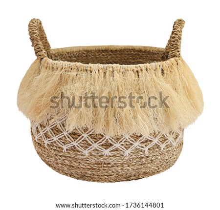 woven laundry basket isolated on white background . Details of modern boho bohemian style eco design interior