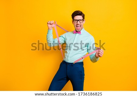 Portrait of funny funky crazy guy pull his suspenders feel candid face expression shout wear good look outfit isolated over shine color background
