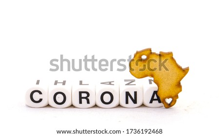 The shape of the African continent and the text word corona isolated on a clear background image with copy space in horizontal format
