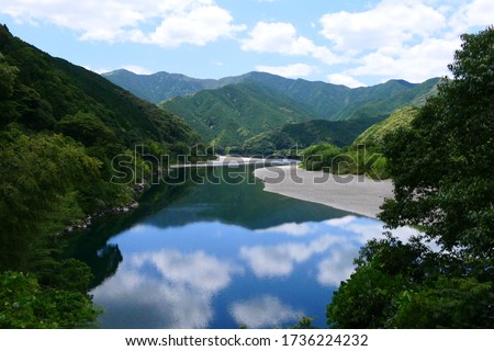 Japanese clear stream.This place is Shimantogawa River.Kochi,Japan.Early June.
 Royalty-Free Stock Photo #1736224232
