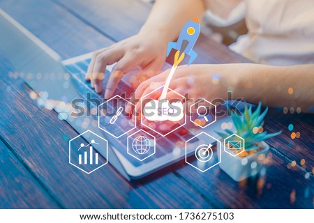 SEO Search Engine Optimization concept with laptop computer. ranking traffic on website, internet technology for business company. Royalty-Free Stock Photo #1736275103