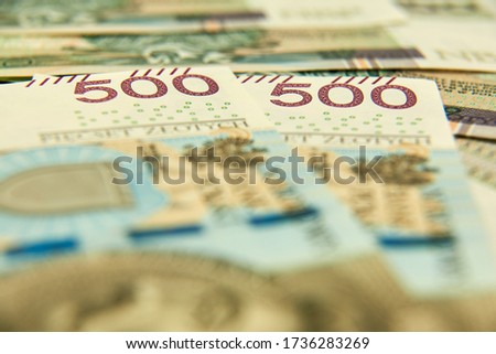 Banknotes stacked one after the other