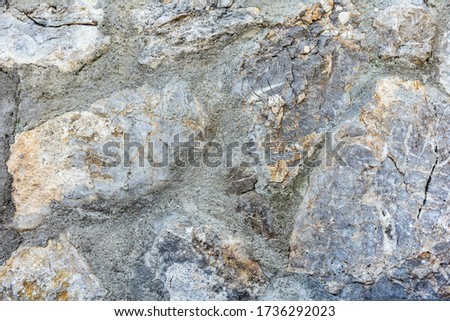 Wall with stones background and texture
