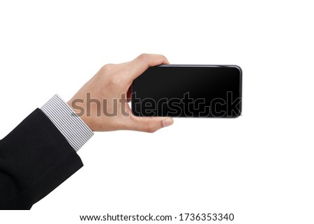 Woman hand holding and showing blank smartphone screen on isolated white background with clipping path display concept. Hand of business man hold smartphone take pictures the landscape horizontal